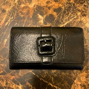 Black RGA trifold wallet with faux buckle detail